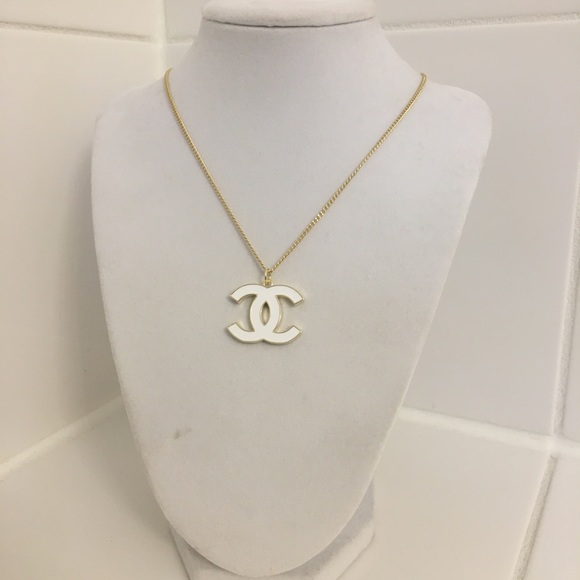 CHANEL Accessories - Chanel Ivory enamel pendant